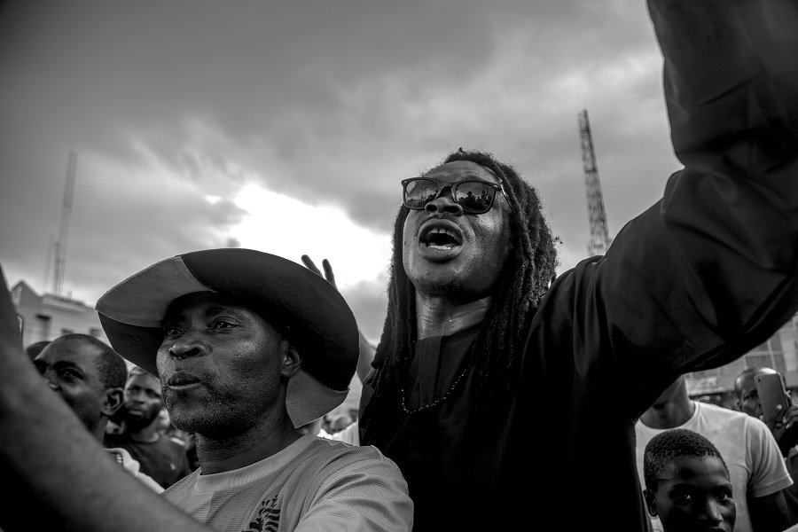 Mother with baby confronts police after teargas, pepper spray used on protesters