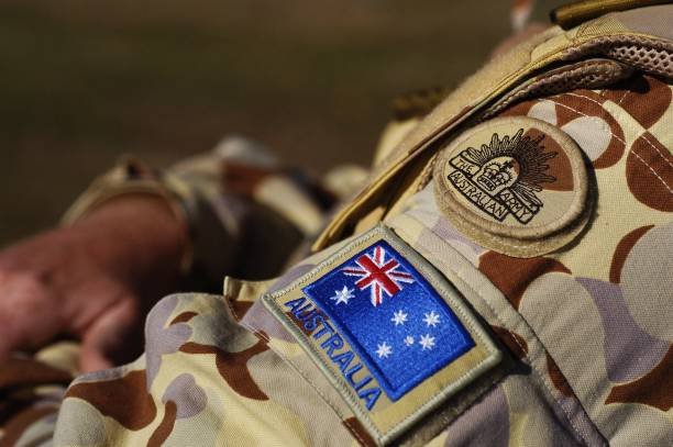 Australia strips officers` medals for war crimes culture